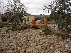 Pebbled Dry Creek Bed And Bridge.jpg